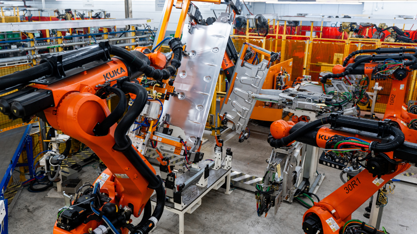 KR QUANTEC robots handle skid plates