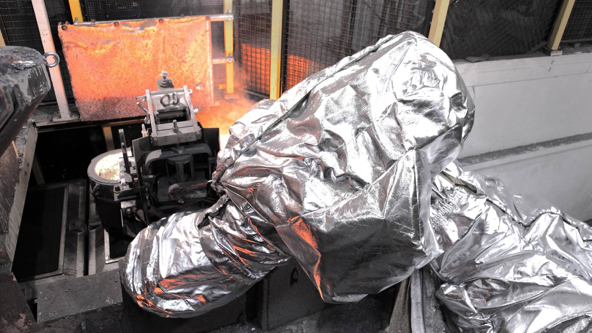 KUKA robot protected from heat in use at the foundry
